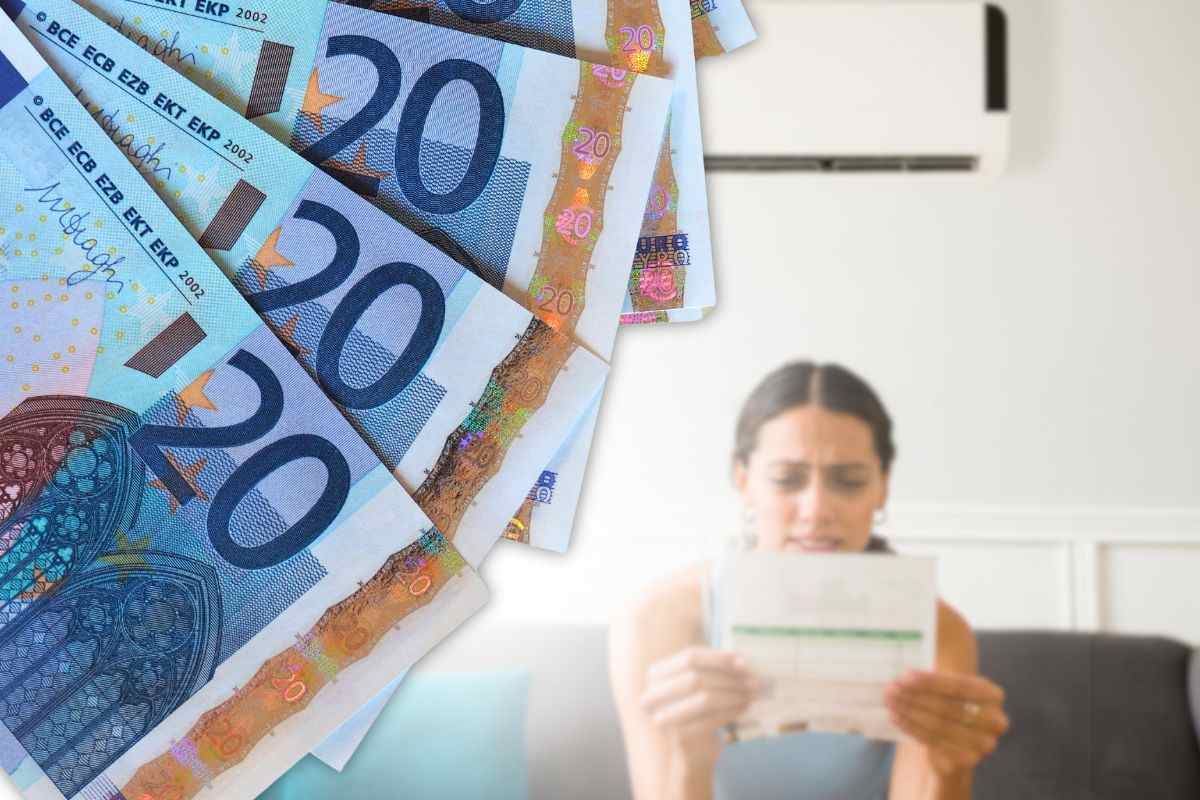 banconote 20 euro come bonus e ragazza guarda bolletta