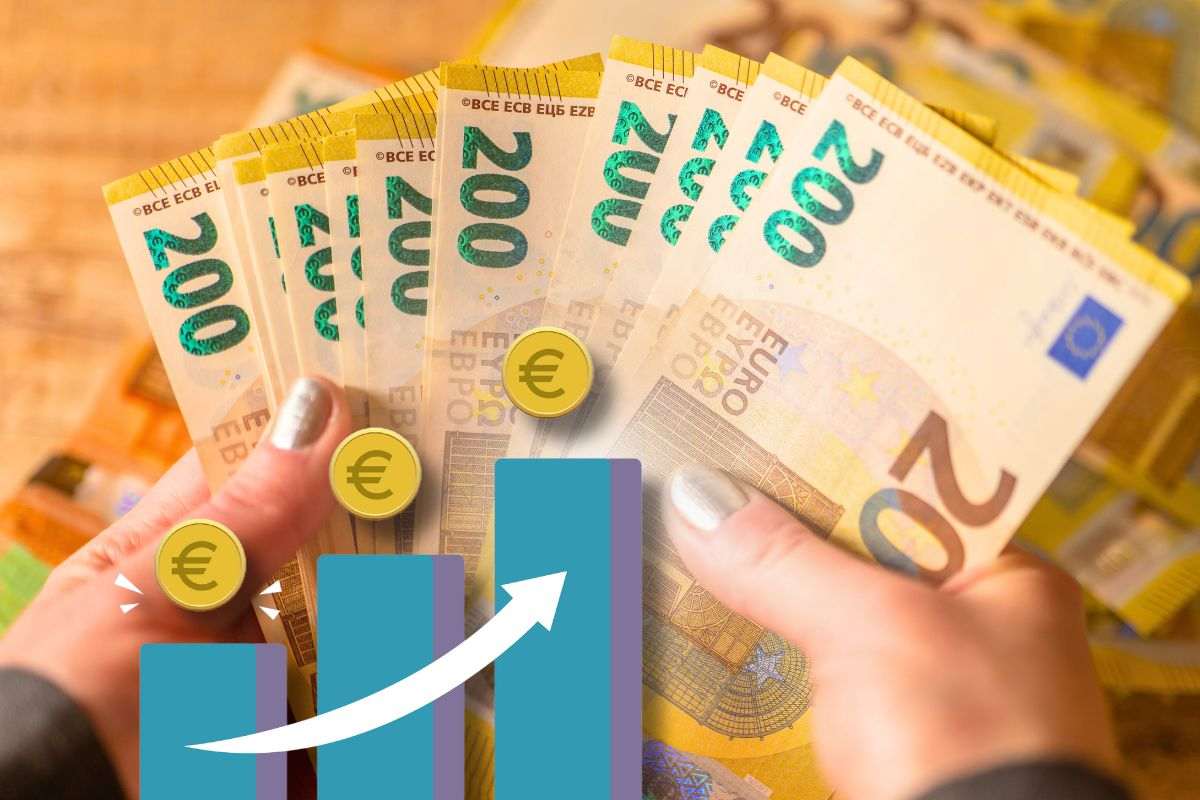 banconote 200 euro per aumento di stipendi e grafico euro in aumento