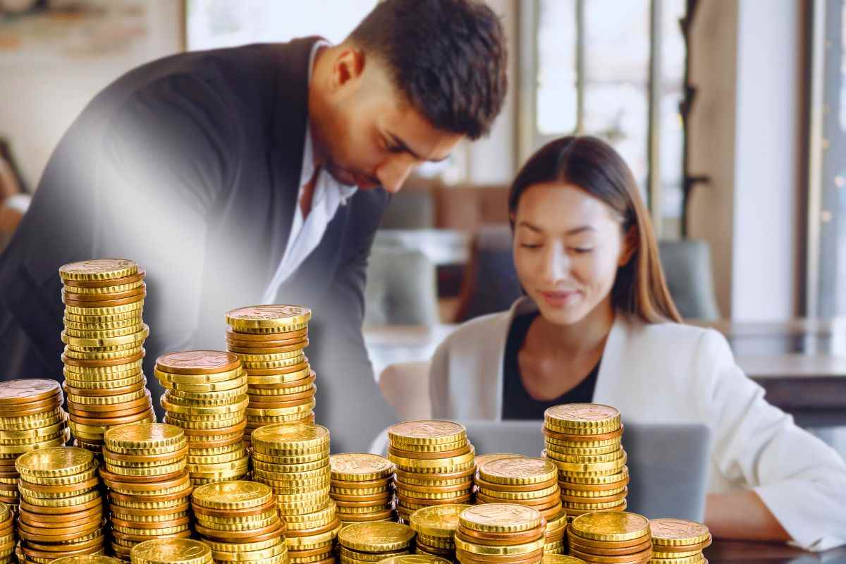 focus monete euro bonus 4000 euro e sfondo lavoratori