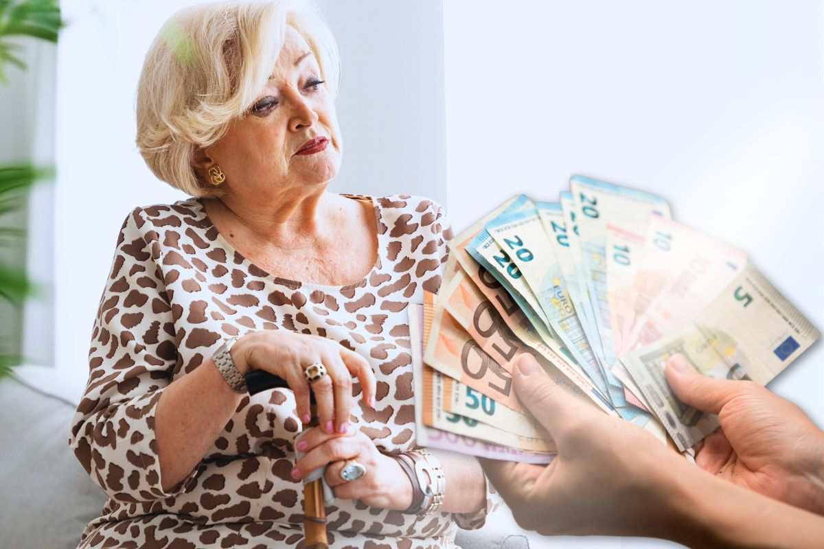 pensionata sfondo e focus banconote euro in mano