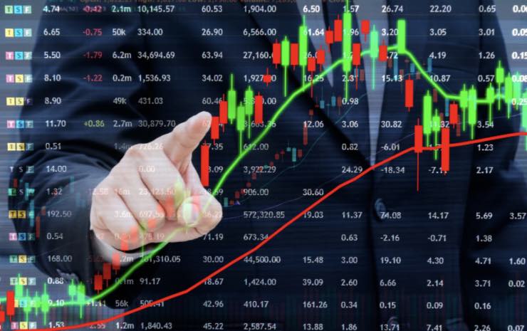 Trader indica grafico finanziario