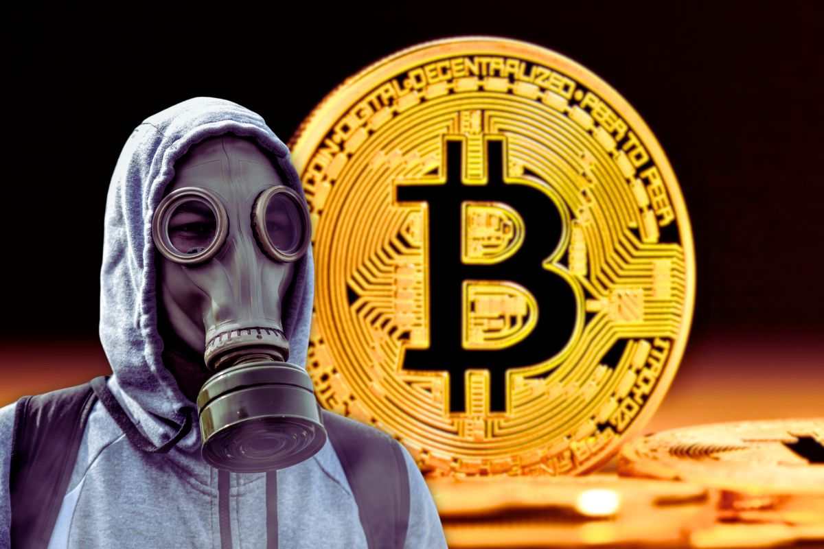 sfondo con bitcoin e persona con maschera antigas