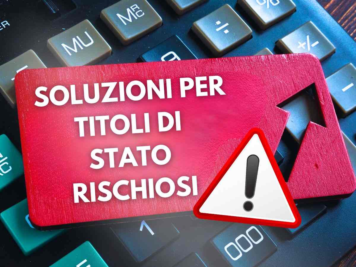 tastiera pc con messaggio: "soluzioni per titoli di stato rischiosi" e simbolo pericolo